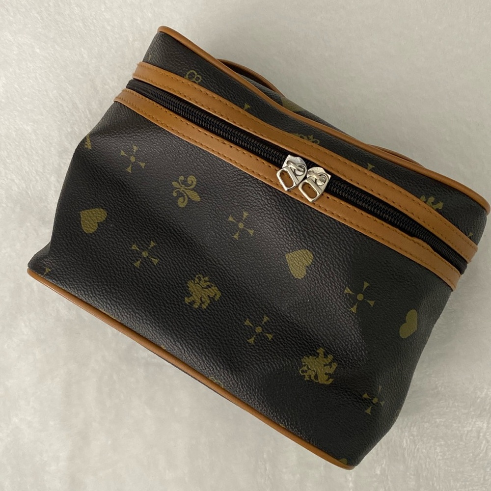 Dark brown royal-themed cosmetics bag